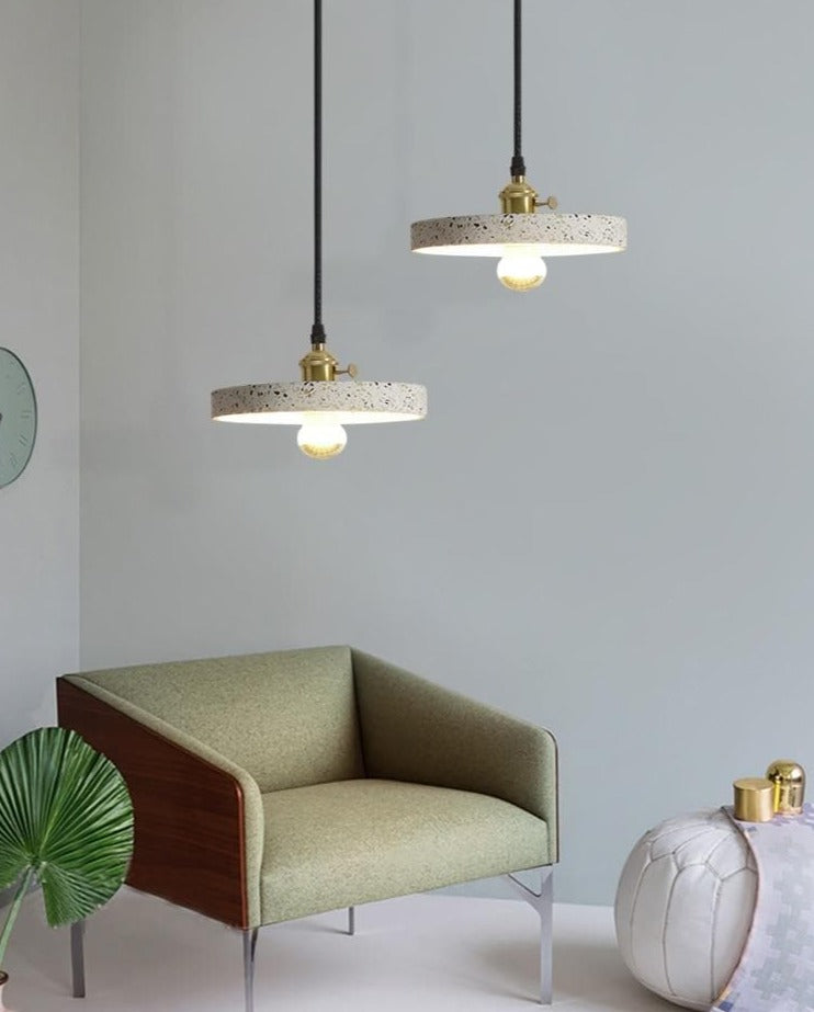 two Modern Stylish Stone pendant lights in geometric shapes with black cord