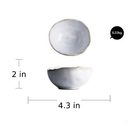 round abstract gold trim edges white ceramic bowl