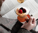 triangular clear borosilicate glass cup with amber thin handle