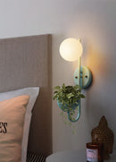 vertical abstract iron blue frosted glass with plant container wall lamp