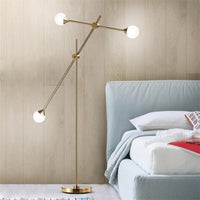 Three Bulb Dynamic Floor Lamp in Brass-Letifly Lights and Decor
